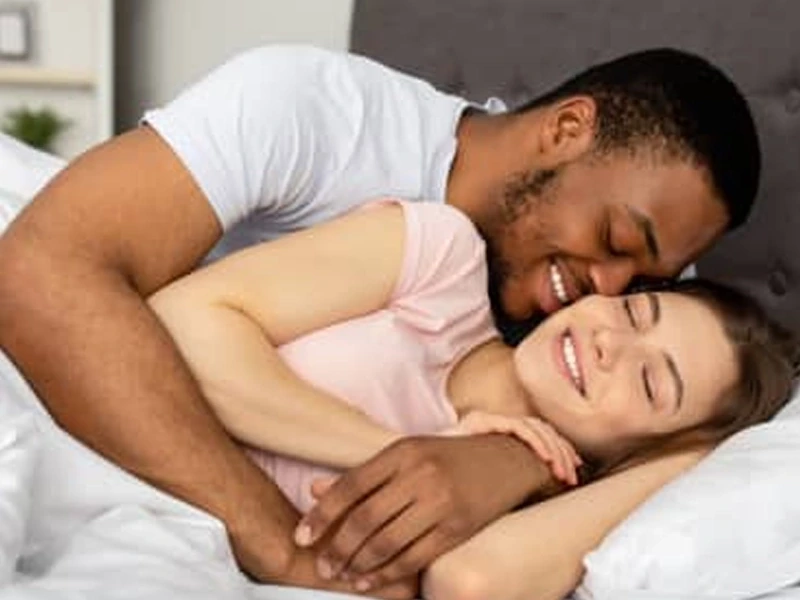 A couple sharing a tender, intimate moment